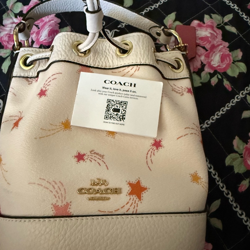 Coach Cream and Orange Star Backpack
